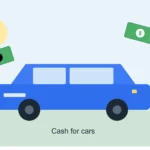 Cash for cars pickup truck towing an old sedan away